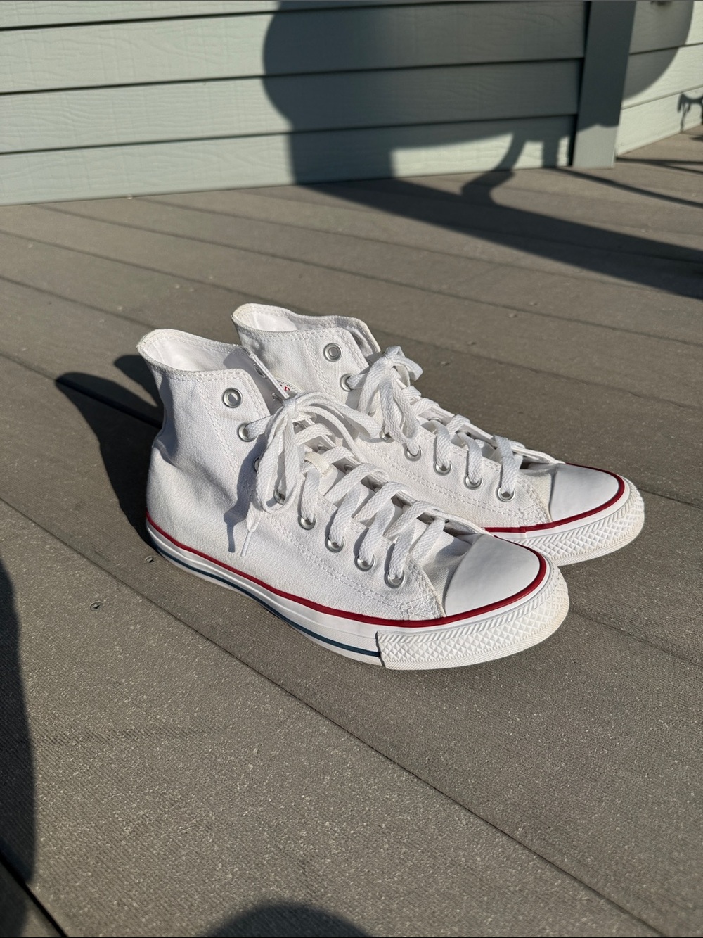 Converse High Top Sneakers in White with Red Trim